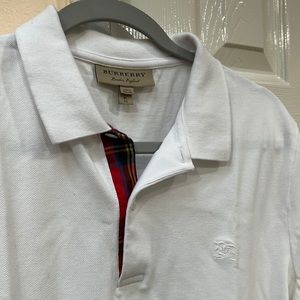Burberry top used in good condition  Armpit of shirt have  discoloration